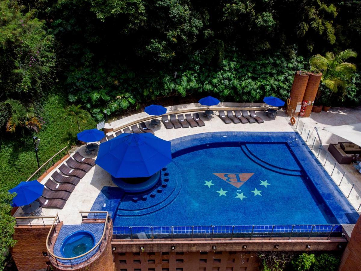 Hotel Dann Carlton Belfort Медельин Экстерьер фото The swimming pool at the hotel